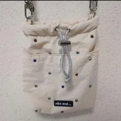 ニコアンド…　オリジナルビジュー巾着ショルダーバッグ　アイボリー