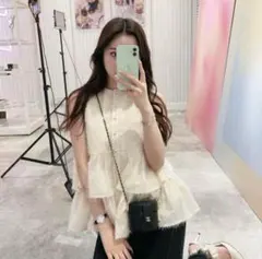 fiolily キラキラトップス スパークリングペプラムスリーブレストップス