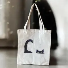 トートバック　黒猫　長いしっぽ　顔半分覗かせる黒猫　布バック　頑丈で軽量　155