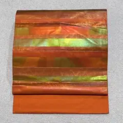 【H56】 光沢感のあるオレンジに玉虫模様のストライプ 名古屋帯