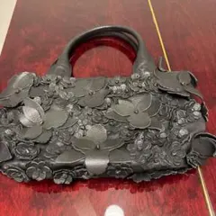 manu ハンドバッグ ブラック 花柄モチーフのサムネイル