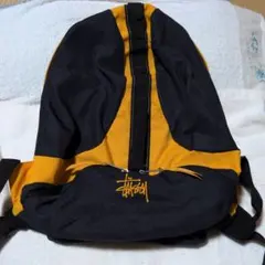 未使用保管品　ステューシーりュック　濃紺×カラシのサムネイル