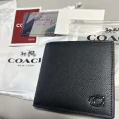新品未使用COACH 二つ折り財布　レディース メンズ シンプル ブラックのサムネイル