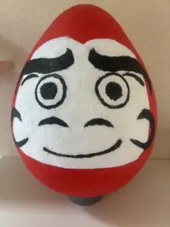 赤色卵型置物 顔デザイン