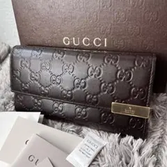 極美品　GUCCI シマ　ロゴプレート　ダークブラウン　フラップ長財布
