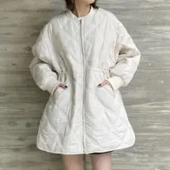 She'sClosetノーカラーミドル丈　ペプラム中綿 キルティングコート　白