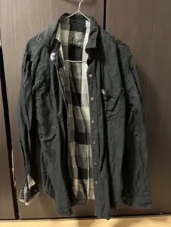 Lacoste 黒 長袖シャツ チェック裏地