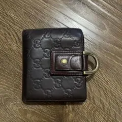 グッチ　二つ折り財布　GG柄　シマレザー　総柄　ロゴ型押し　レザー　濃茶