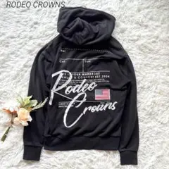 ロデオクラウンズ　ビッグタグプリントパーカー　黒　バックロゴ　刺繍　フード付き