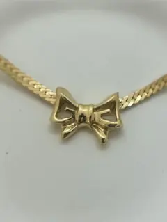 GIVENCHY ネックレス ゴールドカラー リボン ロゴチャーム - メルカリ