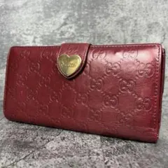GUCCI レッド エンボスロゴ 長財布 - メルカリ