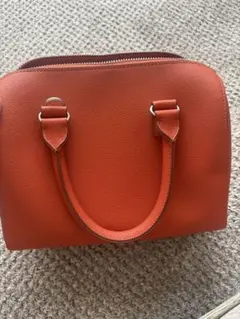 オレンジ ハンドバッグ