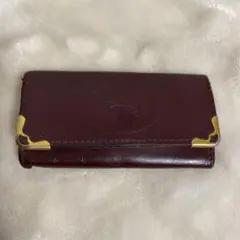 Cartier バーガンディ レザー キーケース ゴールド金具