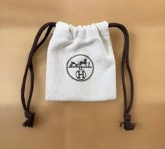 HERMES 巾着袋 ヘリンボーン ベージュ - メルカリ