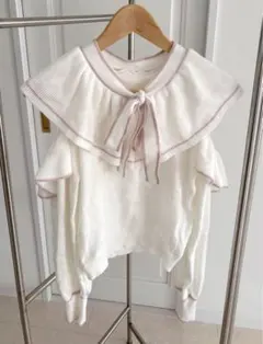 エブリン ショルダーカットフリルニット