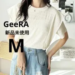 GeeRA ジーラ　ラッフルフリルショルダー表面感Tシャツ　オフホワイト　Mのサムネイル