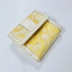 COACH コーチ 二つ折り財布 キャンバス 白 イエロー 黄色 シグネチャー