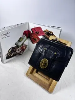 コーチ　レガシー　ターンロック　折り財布　ブラックレザー