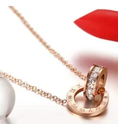 【最安値】ダブルリング ゴールドネックレス　サージカルステンレス 【新品未使用】