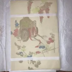 名古屋帯 花と車輪の模様