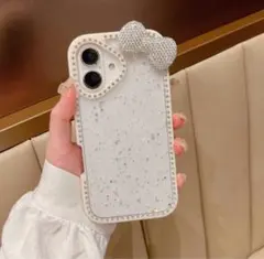 ホワイトラメ入りリボン付きiPhoneケース 15pro