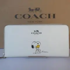 コーチCOACH長財布 ピーナッツ限定コラボ　スヌーピープリント F53773
