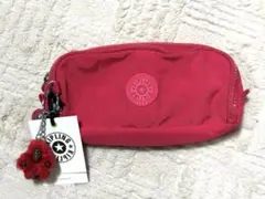 新品未使用　Kipling ナイロンポーチ フラワーチャーム付き ピンク