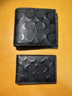 COACH ブラック エンボス 二つ折り財布