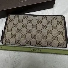 GUCCI 長財布　ラウンドファスナー　キャンバス　ブラウン　メタルロゴ　GG