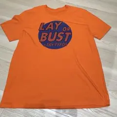 LAY OR BUST プリントTシャツ オレンジ