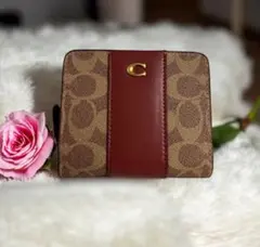 【新品】COACH 二つ折り財布
