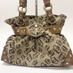 GUESS ハンドバッグ モノグラムパイソン柄 スタッズ - メルカリ