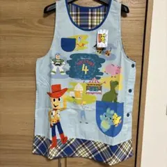 新品 ディズニー トイ・ストーリー エプロン ウッディ 保育士 介護士