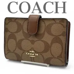 美品 コーチ 二つ折り財布 コンパクト PVCレザー シグネチャー ロゴ s19