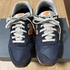 New Balance 373 ネイビー/オレンジ スニーカー