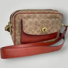 美品 COACH ショルダーバッグ シグネチャー　ターンロック　ブラウンのサムネイル