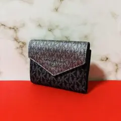 0048 MICHAEL KORS レザー ラメ感 MKロゴ 折り財布