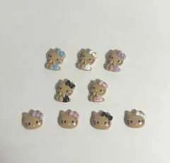 No.902 青の日焼けハローキティ ネイルパーツ6個 - メルカリ