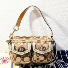 コーチ ハンドバッグ　アクセサリーポーチ　シグネチャー　ターンロック　キャンバス COACH（コーチ） ポーチ クリップ オン ポーチ・シグネチャー