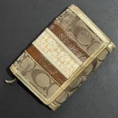 COACH シグネチャー 二つ折り財布