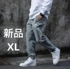 新品　NIKEナイキ　ウーブン　ジョガーパンツ　グレー　XL