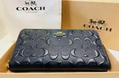 COACH コーチ　長財布　エンボス ブラック　財布のサムネイル