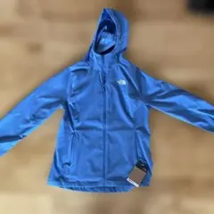 新品タグ付き THE NORTH FACE マウンテンパーカー 濃いめの水色のサムネイル