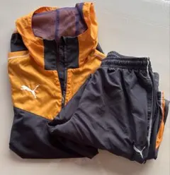 PUMA ピステ・ウィンドブレーカー オレンジ/ブラック