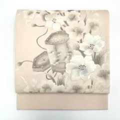 袋帯 正絹 貝桶 花菱 七宝 桔梗 菖蒲 花 吉祥文様 太鼓柄 薄ピンク 刺繍のサムネイル