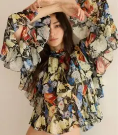 poppyシースルートップス チューリップ柄 タートルネック | Mercari