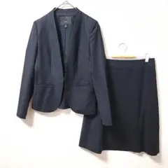 【細見え】iCB ノーカラージャケット スカートスーツ ネイビー Mのサムネイル
