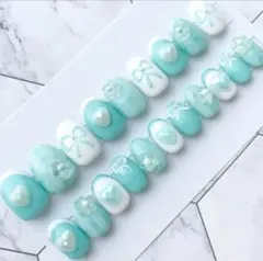 水色と白のリボン装飾ネイルチップ