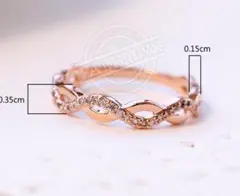 R-019 ローズゴールド インフィニティリング 指輪 クリスタルストーンクロス