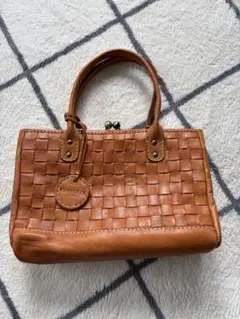 美品　zucchero filato 本革 メッシュ 編み込み がま口 バッグのサムネイル